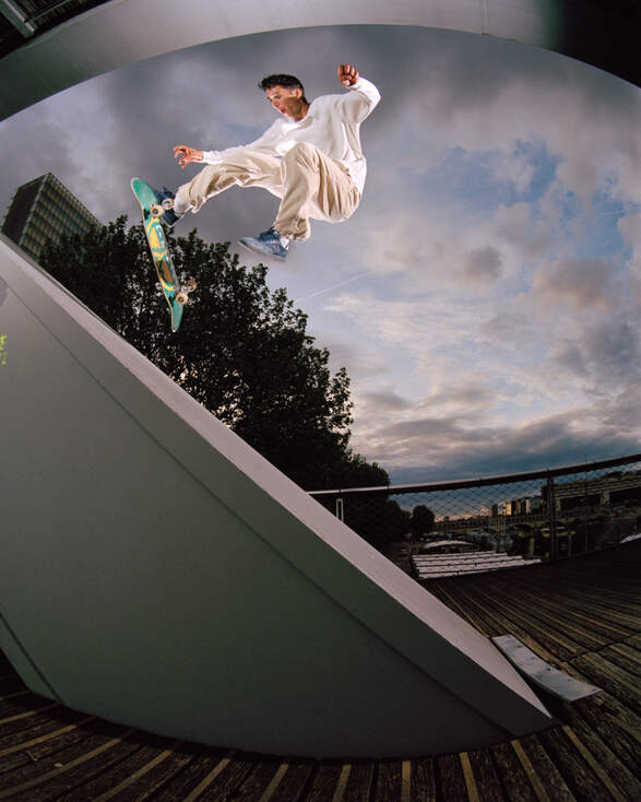 Tom Knox skating outdoors on ramp