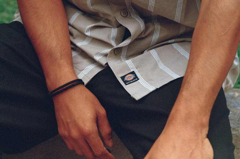 Close up of Dickies patch logo on button down shirt