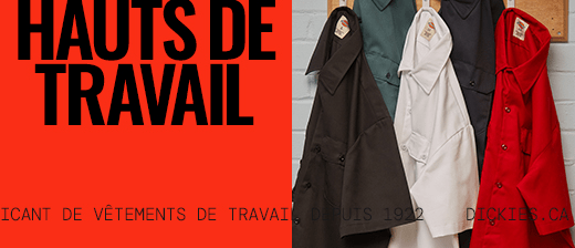 several dickies work shirts hanging on a wall