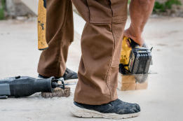 With garment-strengthening fabrics, finishes, and details.