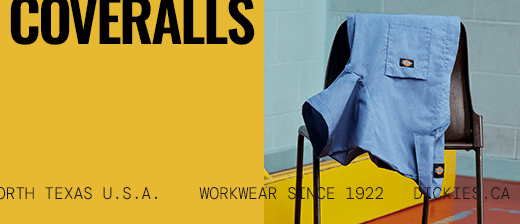 several dickies work shirts hanging on a wall